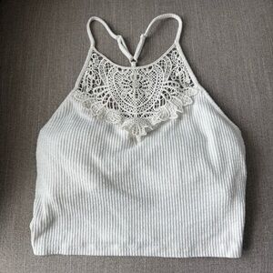 So Women’s white ribbed knit high-neck crop top with crochet lace trim - S
